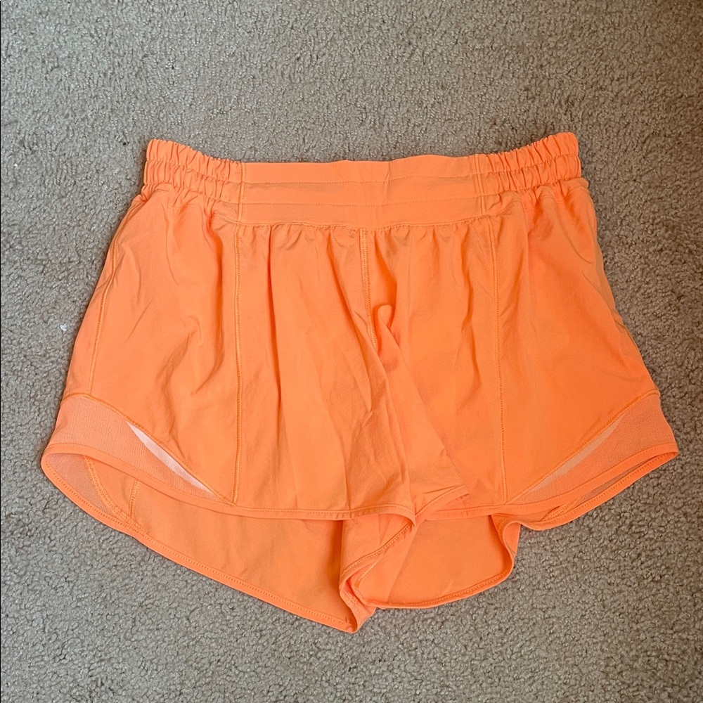 Lululemon Orange Hotty Hot Shorts 4” inseam size 6